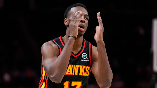 Atlanta Hawks forward Onyeka Okongwu pleads with a referee.